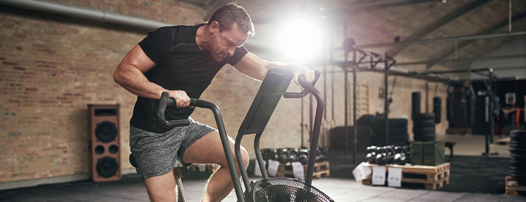 Man doing cardio workout on machine